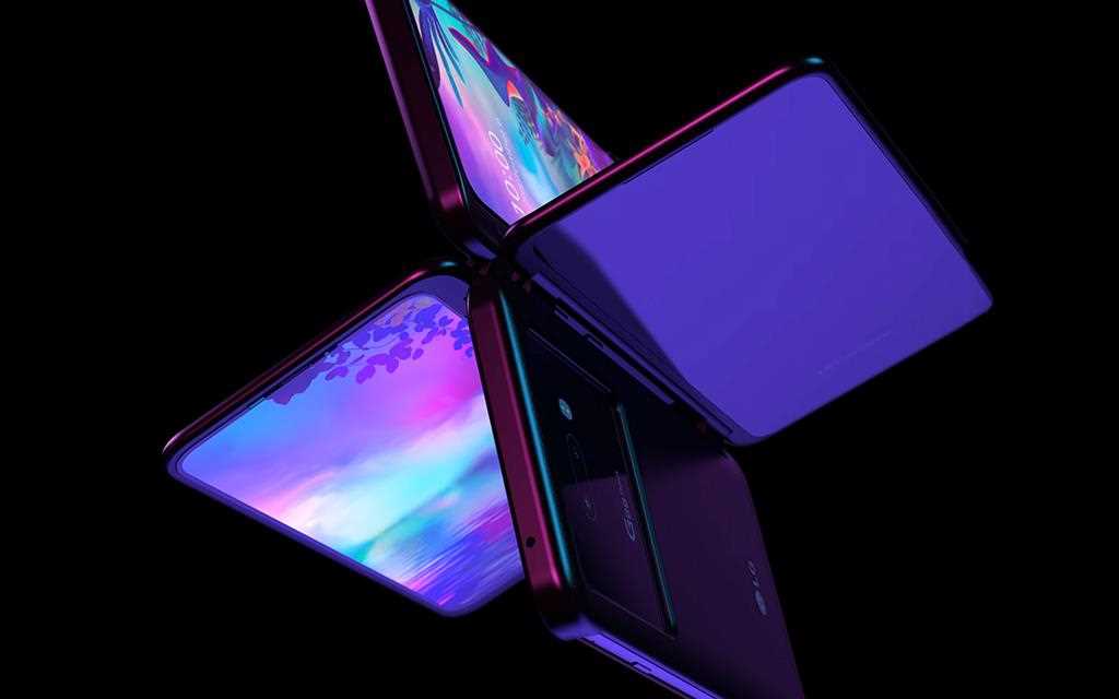 The LG G8X ThinQ Dual Screen open in a butterfly pattern with another phone | More at LG MAGAZINE