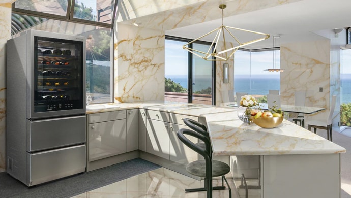 LG SIGNATURE Bottom Freezer fits right in in an airy, bright marble kitchen